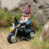 un nain de jardin sur un moto qui fait un doigt d honneur